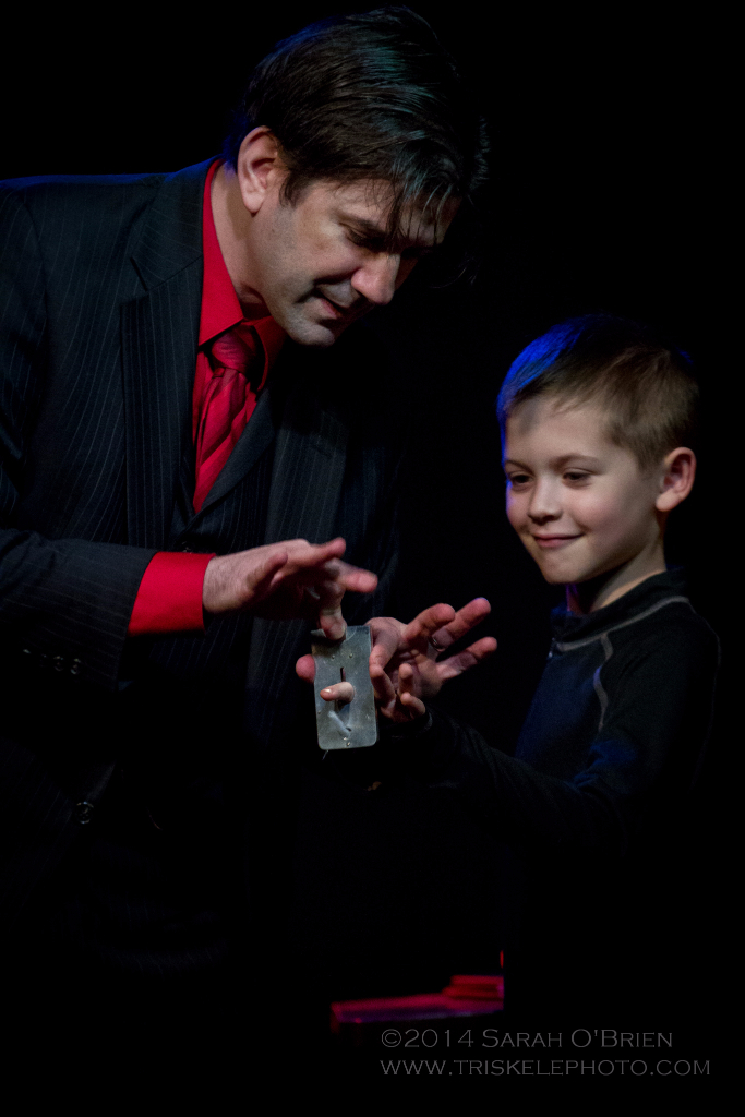 boy helping with magic trick